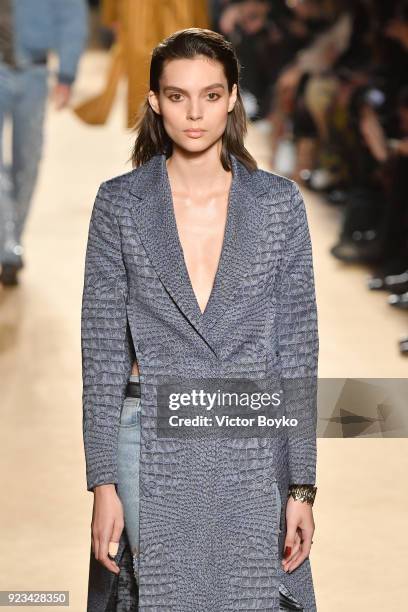 Model walks the runway at the Roberto Cavalli show during Milan Fashion Week Fall/Winter 2018/19 on February 23, 2018 in Milan, Italy.