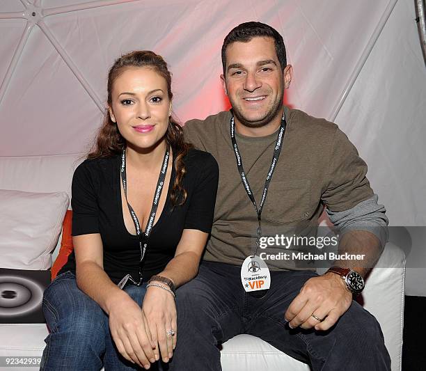 Actress Alyssa Milano and agent David Bugliari attend the BlackBerry VIP Hospitality Lounge at the U2 Concert at the Rose Bowl on October 25, 2009 in...