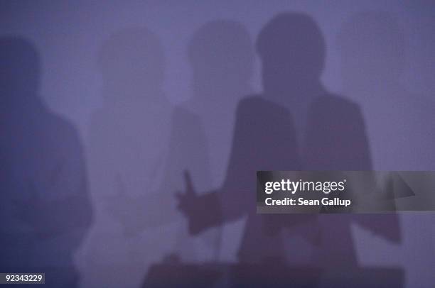 German Chancellor and Chairwoman of the German Christian Democrats Angela Merkel casts a shadow as she speaks to CDU delegates at a special CDU...