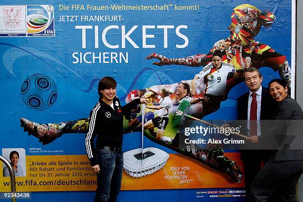 Ariane Hingst of the German national football team, DFB secretary general Wolfgang Niersbach and Steffi Jones, president of the FIFA OK Germany 2011...