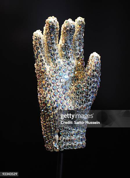 The famous white glove worn by Michael Jackson when he performed Billie Jean at the Grammy Awards in 1983 is seen on display at 'Michael Jackson: The...