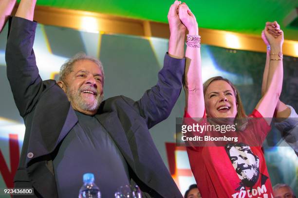 Luiz Inacio Lula da Silva, Brazil's former president, left, and Senator Gleisi Hoffman, president of The Workers' Party , react during the 38th...