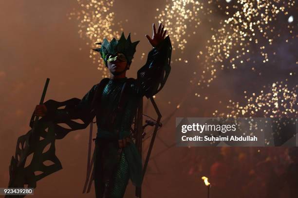 Performers on stilt walkers walk down the street during the Cultural Fantasy, Chingay Parade on February 23, 2018 in Singapore. The Chingay Parade...