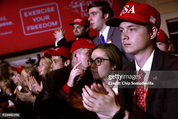 Young supporters cheer as U.S. President Donald Trump addresses the Conservative Political Action Conference at the Gaylord National Resort and...