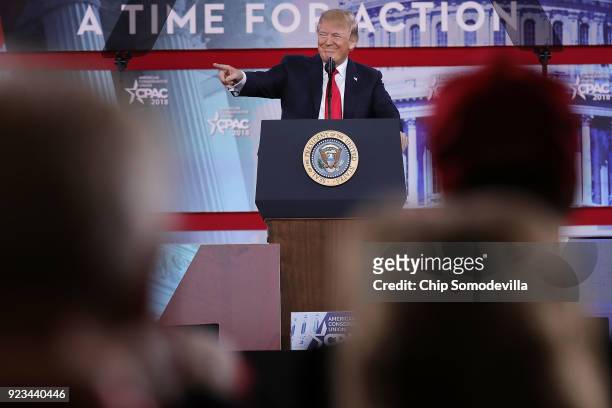 President Donald Trump addresses the Conservative Political Action Conference at the Gaylord National Resort and Convention Center February 23, 2018...