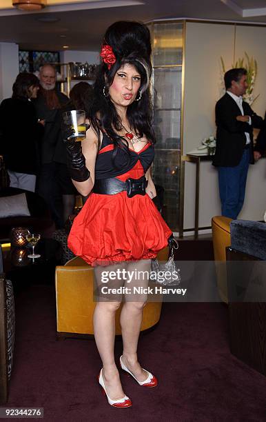 Amy Winehouse lookalike attends Alison Jackson Film Preview Party at the Ivy Club on September 23, 2009 in London, England.