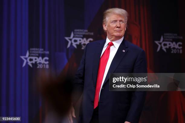 President Donald Trump leaves the stage after addressing the Conservative Political Action Conference at the Gaylord National Resort and Convention...