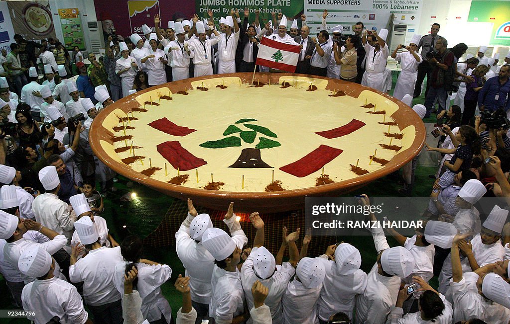 Lebanese chefs celebrate around a large