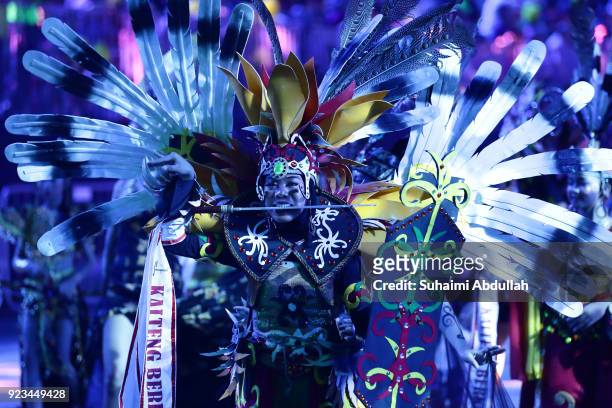 Indonesian performers dance down the street during the Cultural Fantasy, Chingay Parade on February 23, 2018 in Singapore. The Chingay Parade started...
