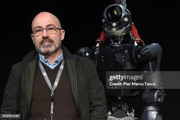 Roberto Cingolani, scientific director of the Italian Institute of Technology and the robot Walk-Man pose during the launch of Corriere Innovazione...