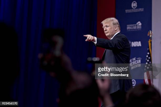 President Donald Trump points after speaking at the Conservative Political Action Conference in National Harbor, Maryland, U.S., on Friday, Feb. 23,...