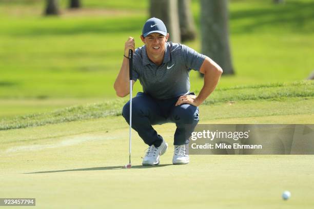 Rory McIlroy of Northern Ireland lines up his shot on the first green during the second round of the Honda Classic at PGA National Resort and Spa on...