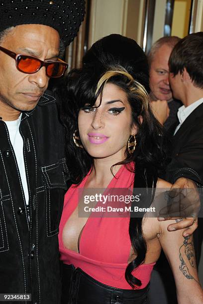 Don Letts and Amy Winehouse attend The Q Awards, at the Grosvenor House on October 26, 2009 in London, England.