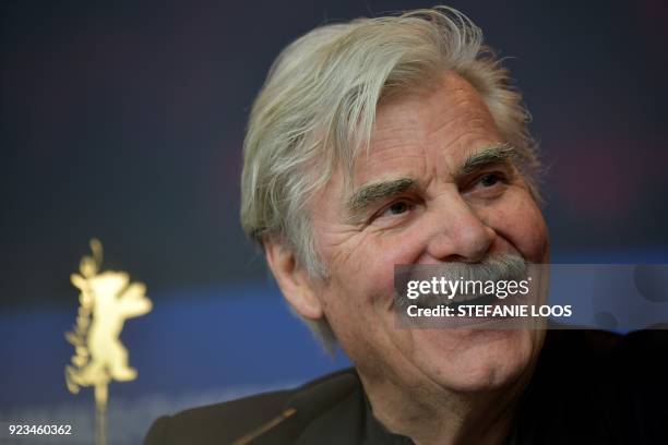 Austrian actor Peter Simonischek speaks during a press conference for the film "The interpreter" presented in the "Berlinale special" category during...