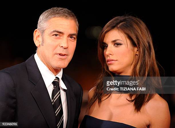 Actor George Clooney and girlfriend Italian model and actress Elisabetta Canalis arrive for the screening of "Up in the Air" on October 17, 2009 at...