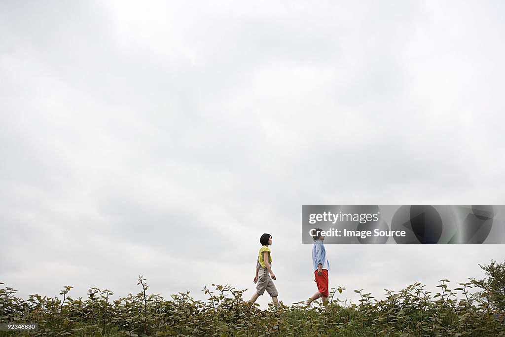 Young couple walking outdoors