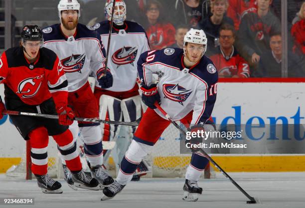 Alexander Wennberg of the Columbus Blue Jackets in action against the New Jersey Devils on February 20, 2018 at Prudential Center in Newark, New...