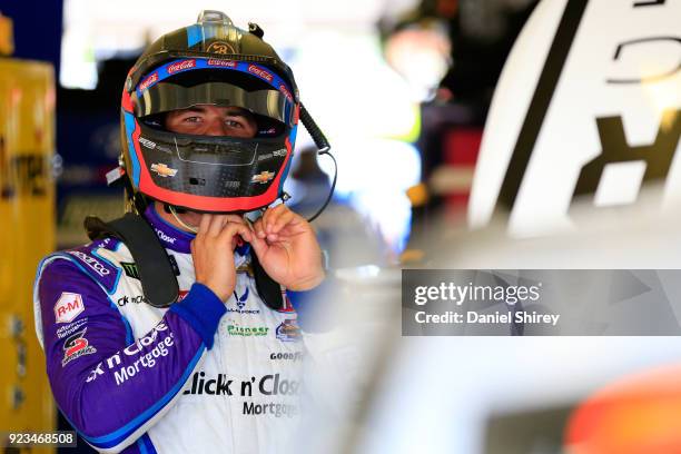 Darrell Wallace Jr., driver of the NASCAR Racing Experience Chevrolet, looks on from the garage area during practice for the Monster Energy NASCAR...