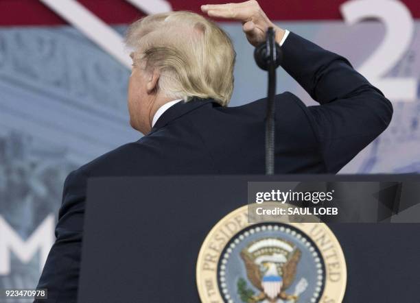 President Donald Trump speaks about his hair during the 2018 Conservative Political Action Conference at National Harbor in Oxon Hill, Maryland,...