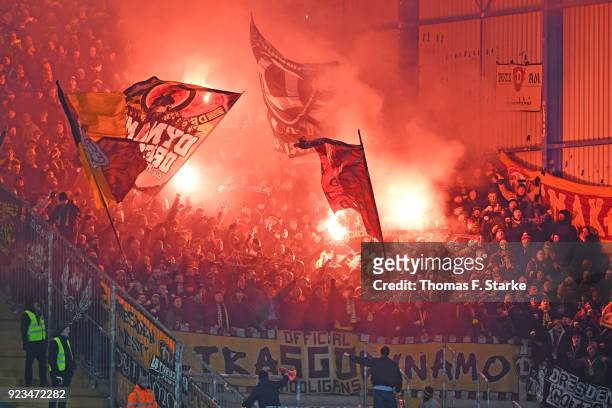 Supporters of Dresden fire smoke bombs during the Second Bundesliga match between DSC Arminia Bielefeld and SG Dynamo Dresden at Schueco Arena on...