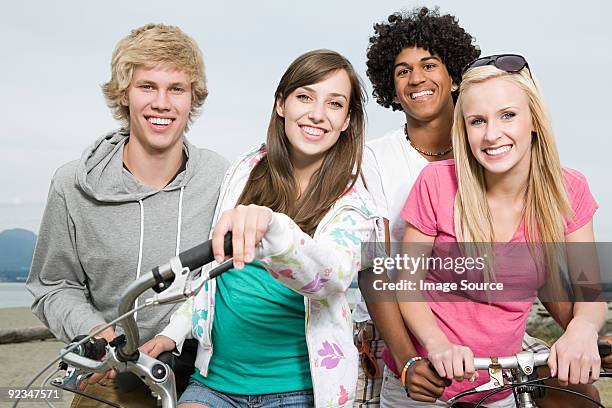 teenagers with bicycles - surrey british columbia stock pictures, royalty-free photos & images