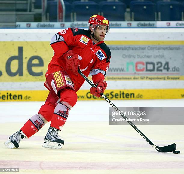 Nikolaus Mondt of Hannover skates with the puck during the DEL match between Hannover Scorpions and Augsburg Panther at the TUI Arena on October 23,...