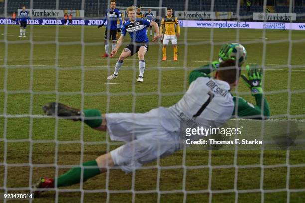 Andreas Voglsammer of Bielefeld scores a penalty against Markus Schubert of Dresden during the Second Bundesliga match between DSC Arminia Bielefeld...