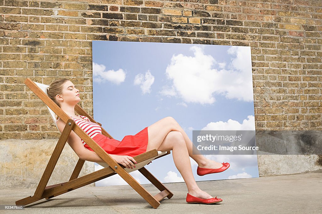 Young woman in deckchair