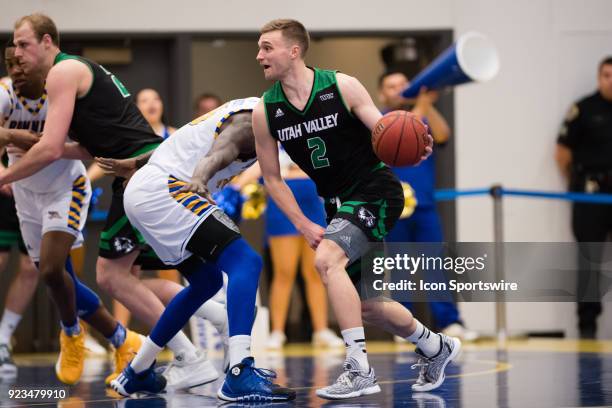 Utah Valley Wolverines guard Jake Toolson drives the ball to the middle of the court during the game between the Utah Valley Wolverines and the Cal...