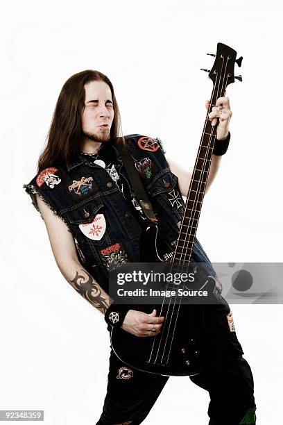 heavy metal bass player - heavy metal stock-fotos und bilder