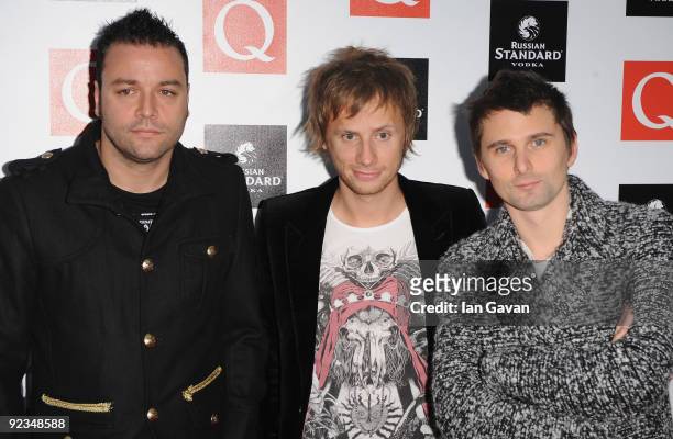 Christopher Wolstenholme, Dominic Howard and matthew Bellamy from Muse attend the Q Awards 2009 at the Grosvenor House Hotel on October 26, 2009 in...