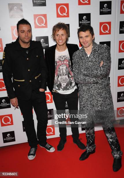 Christopher Wolstenholme, Dominic Howard and matthew Bellamy from Muse attend the Q Awards 2009 at the Grosvenor House Hotel on October 26, 2009 in...