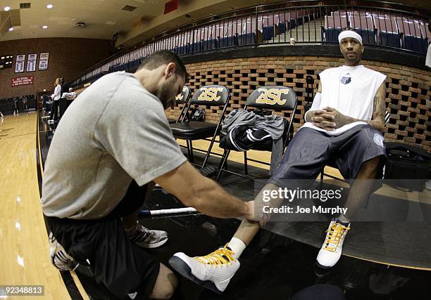 Allen Iverson of the Memphis Grizzlies has his leg checked during the Memphis Grizzlies training camp on September 30, 2009 in the Bill Battle...