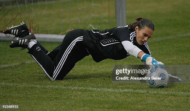 Goalkeeper Nadine Angerer of the women's German national football team saves a ball during a training session on October 26, 2009 in Gersthofen,...
