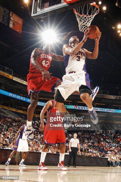 Jared Dudley of the Phoenix Suns puts up a shot against Elton Brand of the Philadelphia 76ers during the preseason game on October 16, 2009 at US...