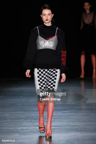 Model walks the runway at the Daizy Shely show during Milan Fashion Week Fall/Winter 2018/19 on February 22, 2018 in Milan, Italy.