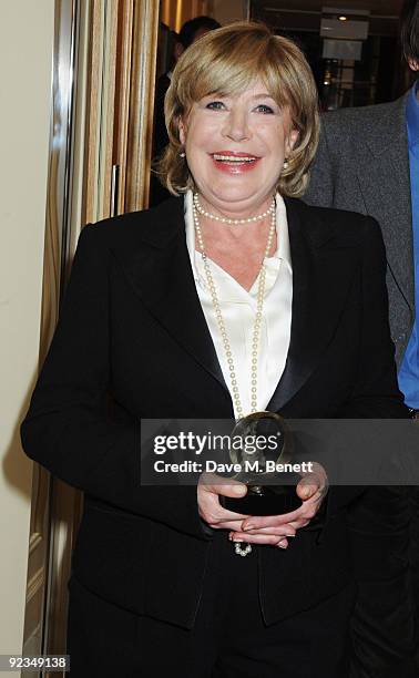 Marianne Faithful poses with The Q Icon Award at The Q Awards, at the Grosvenor House on October 26, 2009 in London, England.