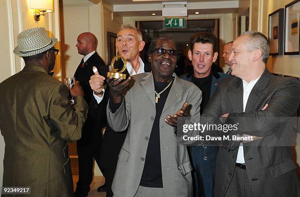 The Specials pose with The Q Inspiration Award at The Q Awards, at the Grosvenor House on October 26, 2009 in London, England.