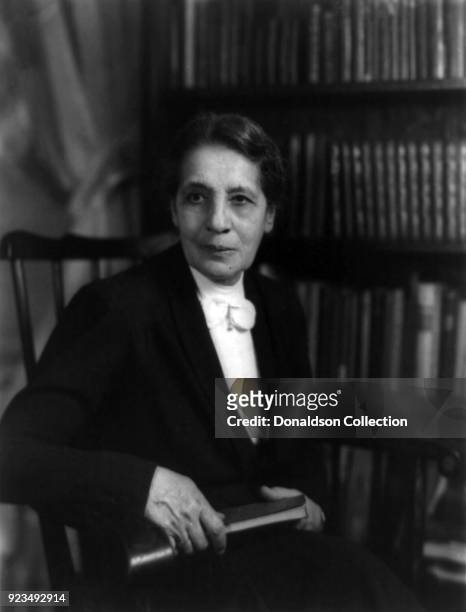 Dr. Lise Meitner, Austrian physicist, three-quarter length portrait, seated, facing left in circa 1940.