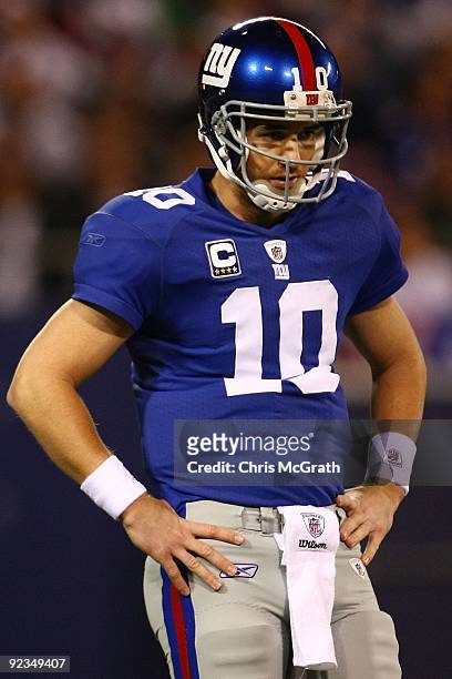 Eli Manning of the New York Giants reacts after a bad pass against the Arizona Cardinals on October 25, 2009 at Giants Stadium in East Rutherford,...