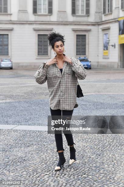 Model arrives at the Versace show during Milan Fashion Week Fall/Winter 2018/19 on February 23, 2018 in Milan, Italy.