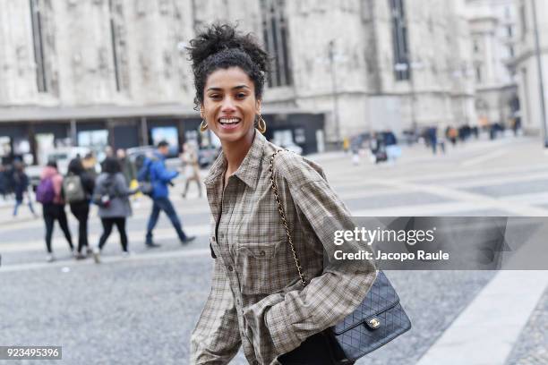 Model arrives at the Versace show during Milan Fashion Week Fall/Winter 2018/19 on February 23, 2018 in Milan, Italy.