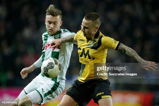 Mike te Wierik of FC Groningen, Jose Angel Esmoris Tasende Angelino of NAC Breda during the Dutch Eredivisie match between FC Groningen v NAC Breda...