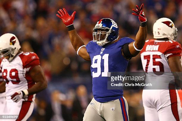 Justin Tuck of the New York Giants calls for the crowd to get loud against the Arizona Cardinals on October 25, 2009 at Giants Stadium in East...