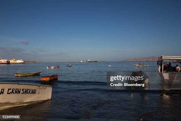 Boats sit docked in the waters of Pozuelos Bay in Puerto La Cruz, Anzoategui state, Venezuela, on Wednesday, Feb. 7, 2018. Hunger is hastening the...