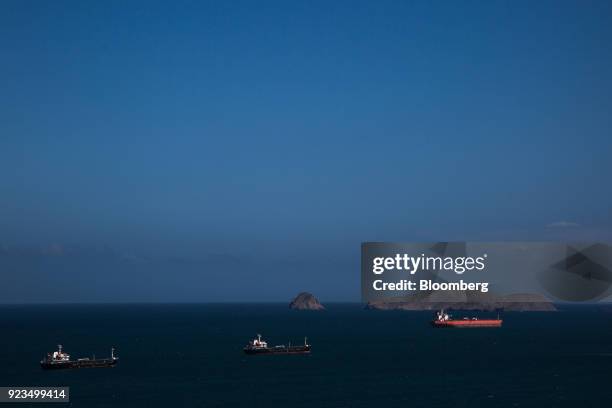 Petroleos de Venezuela SA oil tankers sit moored in the water near Puerto La Cruz, Anzoategui state, Venezuela, on Wednesday, Feb. 7, 2018. Hunger is...