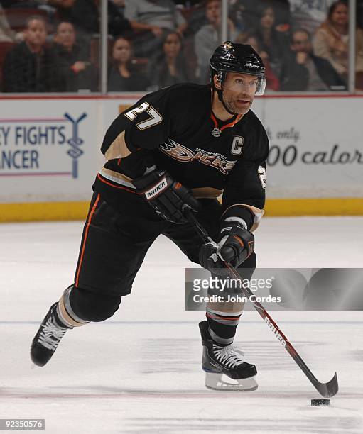 Scott Niedermayer of the Anaheim Ducks skates with the puck during a game against the Columbus Blue Jackets on October 24, 2009 at Honda Center in...