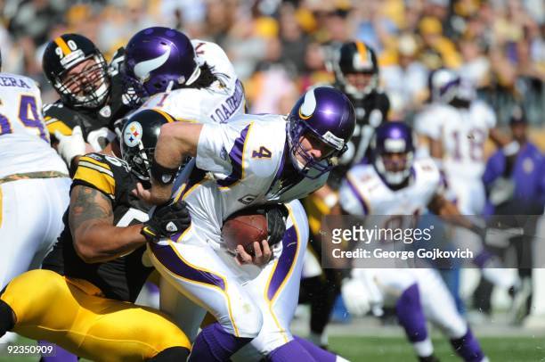 Linebacker LaMarr Woodley of the Pittsburgh Steelers sacks quarterback Brett Favre of the Minnesota Vikings during a game at Heinz Field on October...