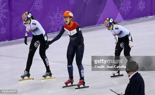 Suzanne Schulting of the Netherlands wins front of Sukhee Shim of South Korea and Minjeong Choi of South Korea during the Short Track Speed Skating...