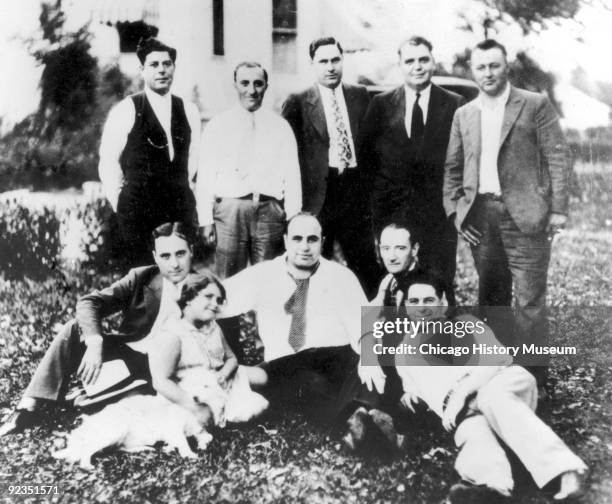 View of gangster Al Capone with family and friends at a picnic, Chicago Heights, IL, 1929. They are Back Row : Rocco De Grazia, Louis "Little New...